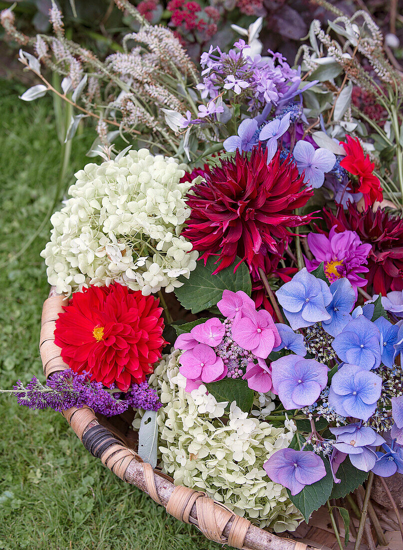 Bouquet with dahlias, hydrangea and summer lilacs