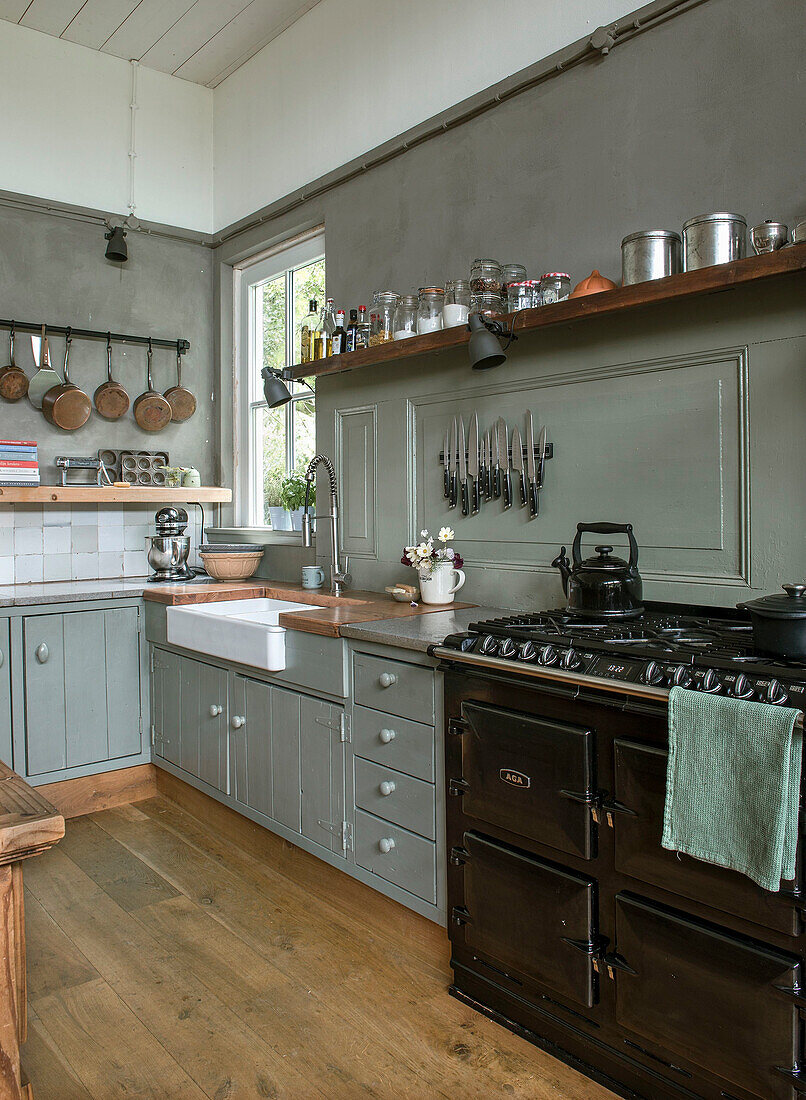 Country kitchen with rustic oven and open shelves