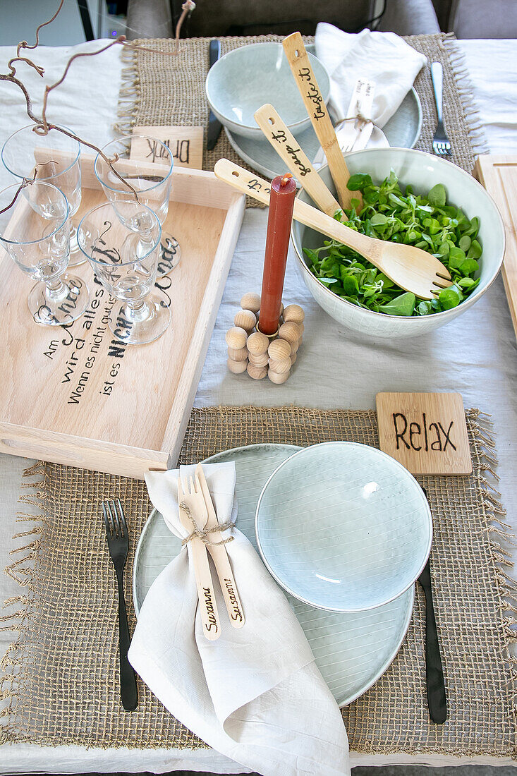 Dining table with personalised wooden objects