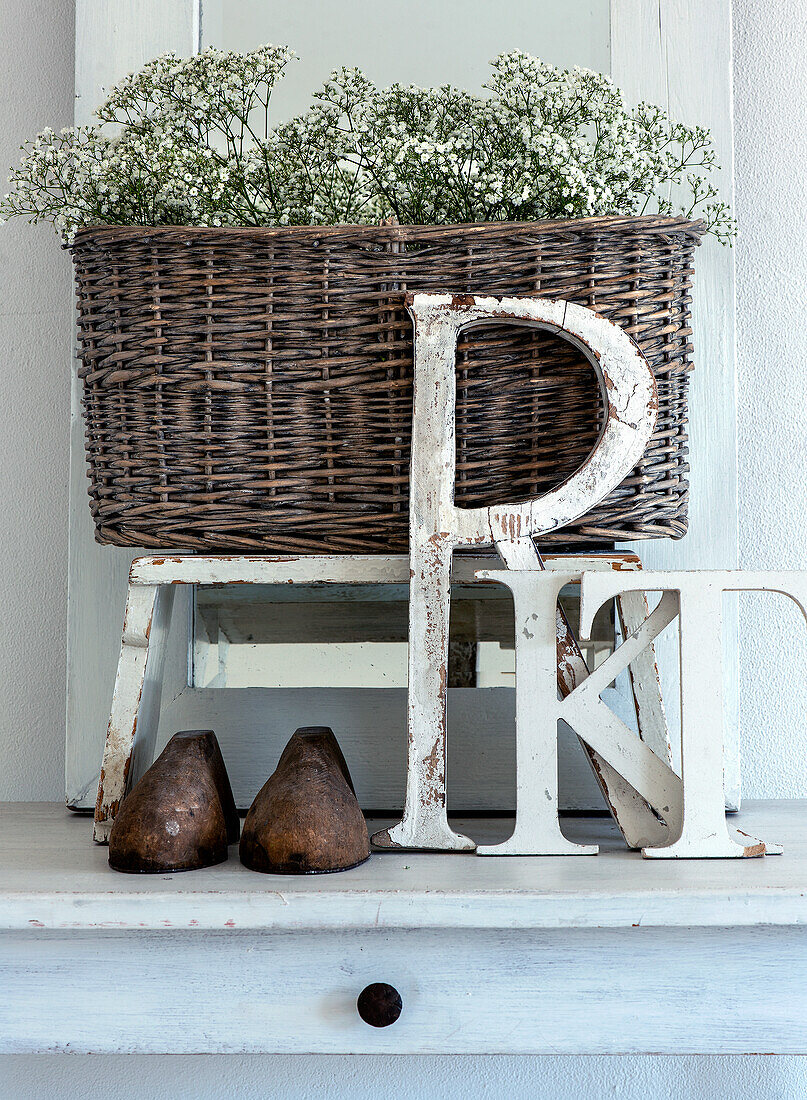 Decorative vintage basket with baby's-breath and wooden letters