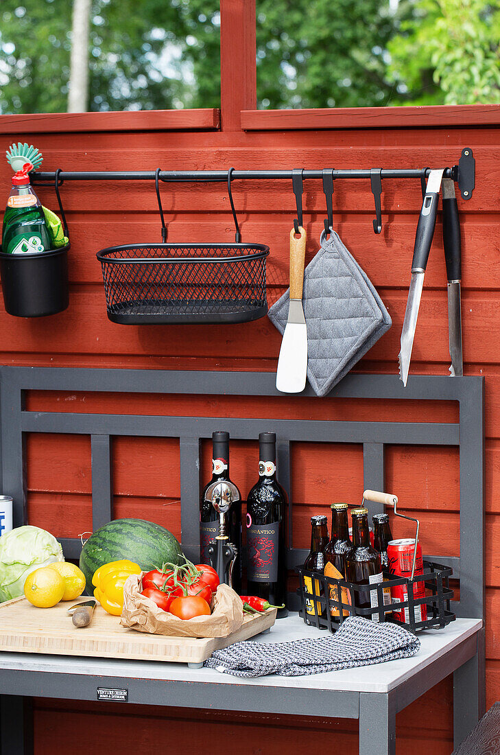 Outdoor kitchen area with fresh fruit and vegetables