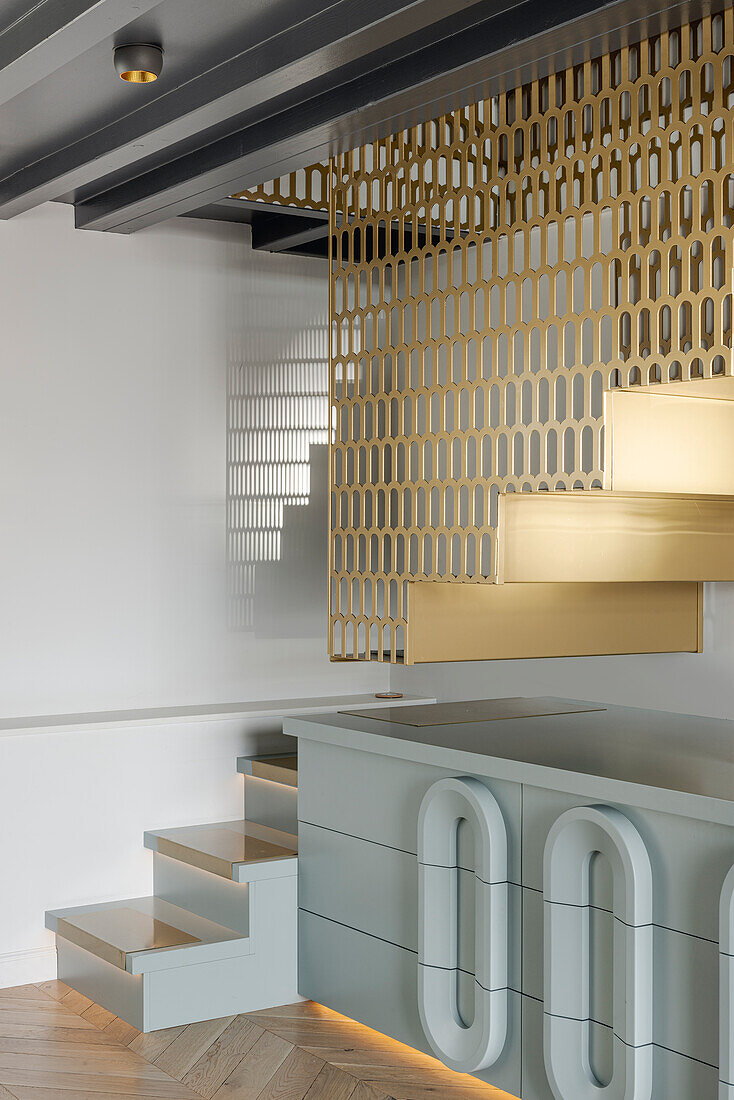 Staircase with modern metal panelling in the living room