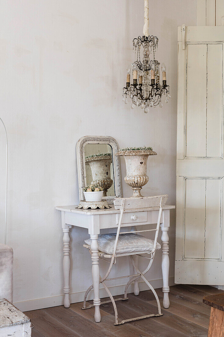 Vintage table with mirror and chandelier