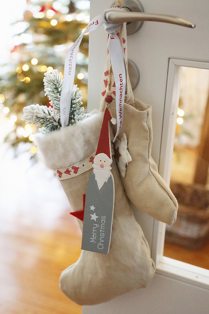 Christmas decorations Home-sewn Christmas stocking on door handle