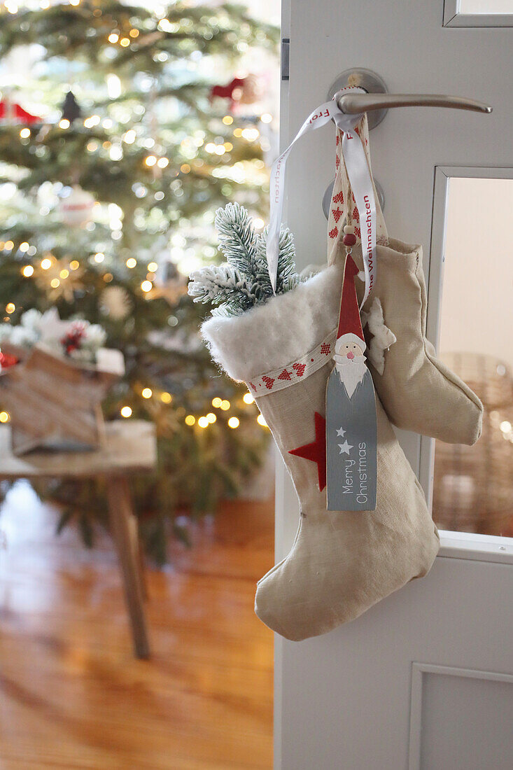 Christmas decorations Home-sewn Christmas stocking on door handle