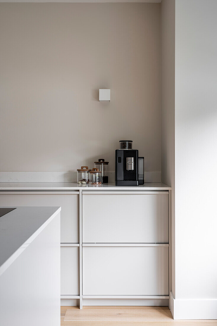 Kitchen corner with coffee machine and storage jars