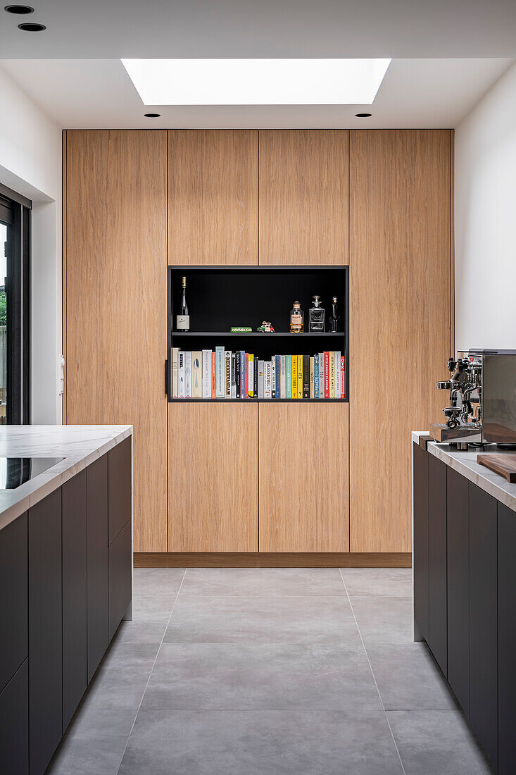 Modern kitchen with black and wooden fitted units