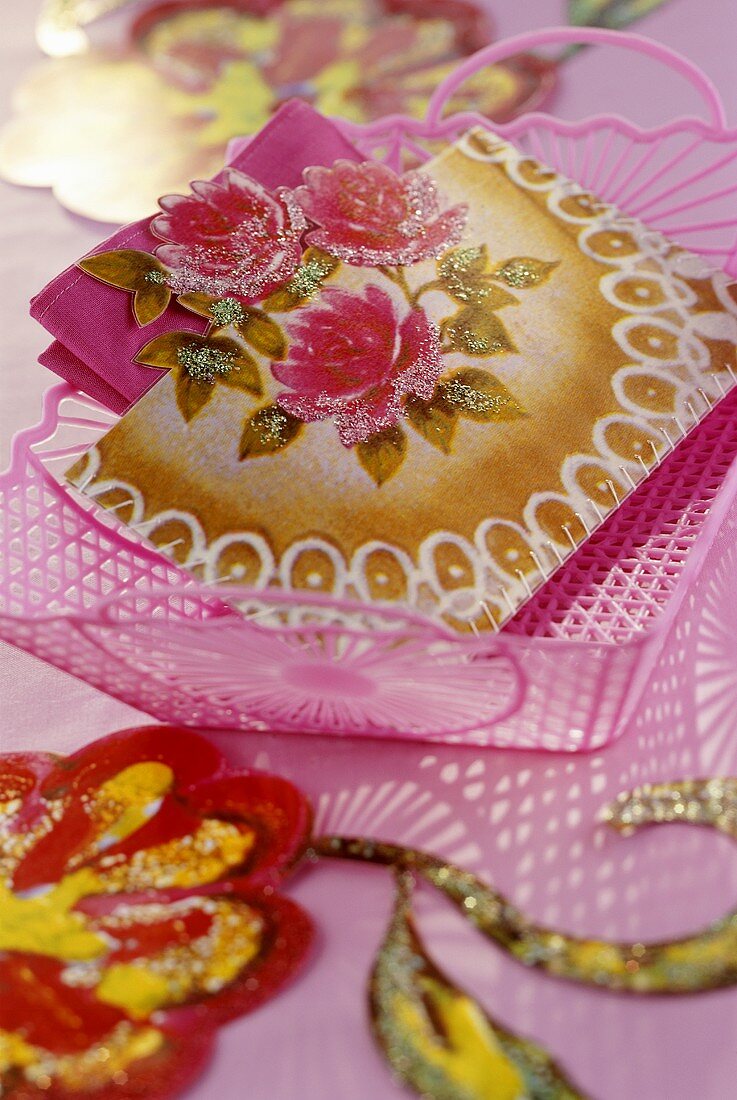 Home-made napkin holder with rose motif
