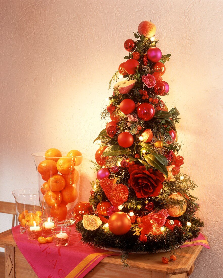 Advent arrangement in shape of Christmas tree