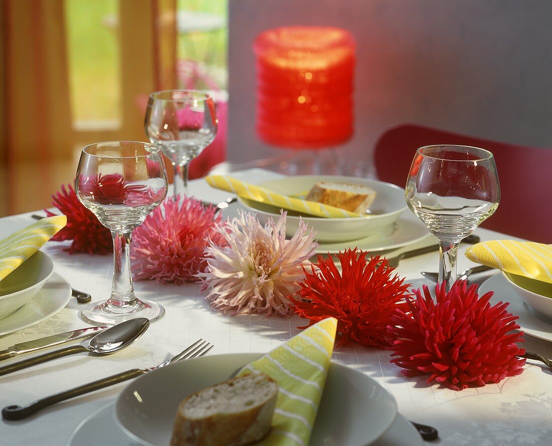 Laid table with dahlias