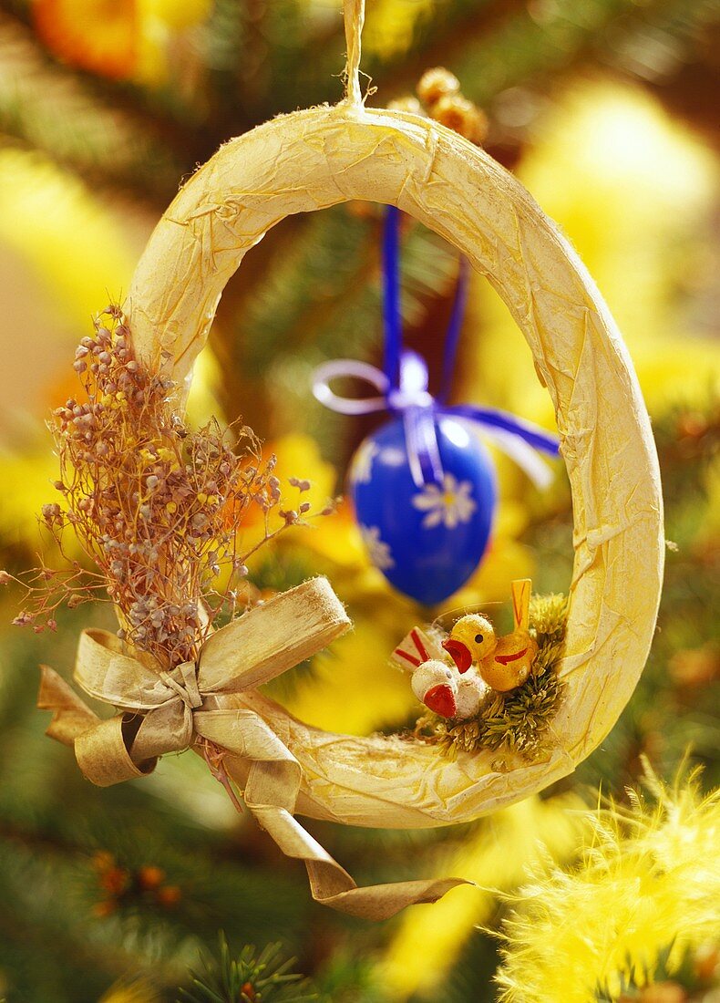 Egg-shaped Easter wreath as tree ornament