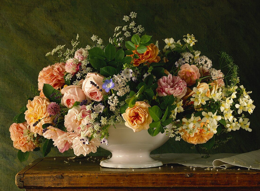 Sumptuous bouquet of roses, ground elder and jasmine