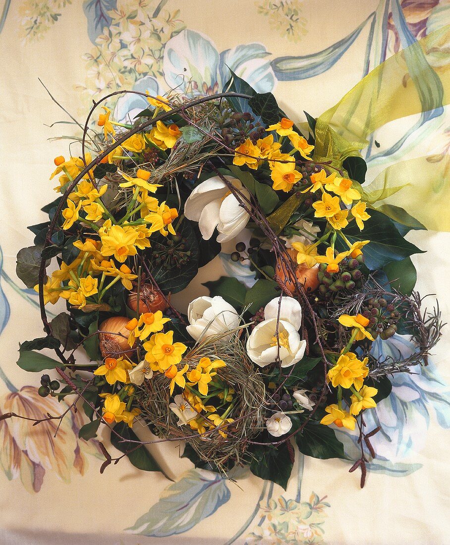 Spring wreath of dwarf narcissi, horned violets, tulips etc.
