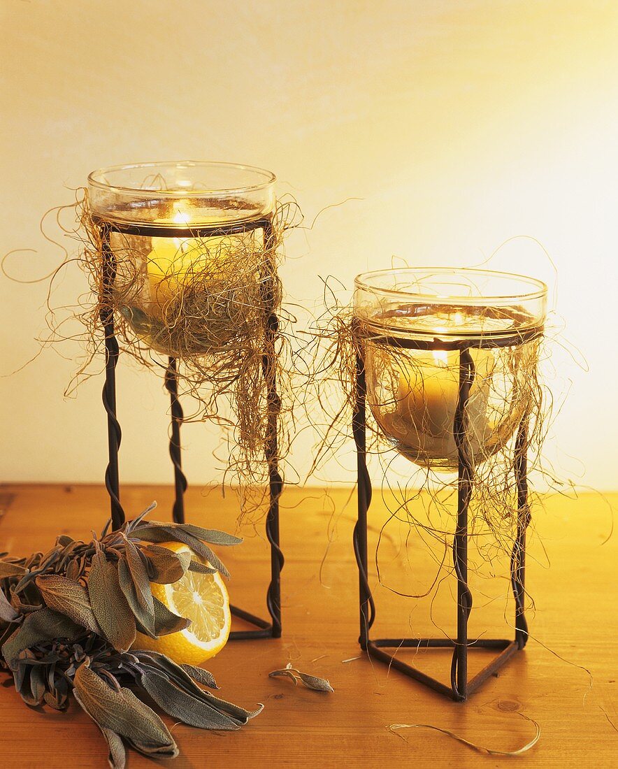 Sage and lemon with small garden lights in metal stands