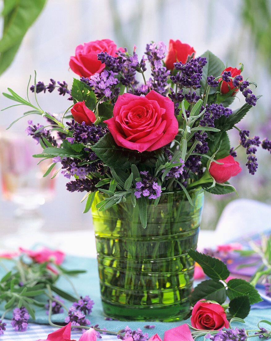 Roses and lavender in glass vase