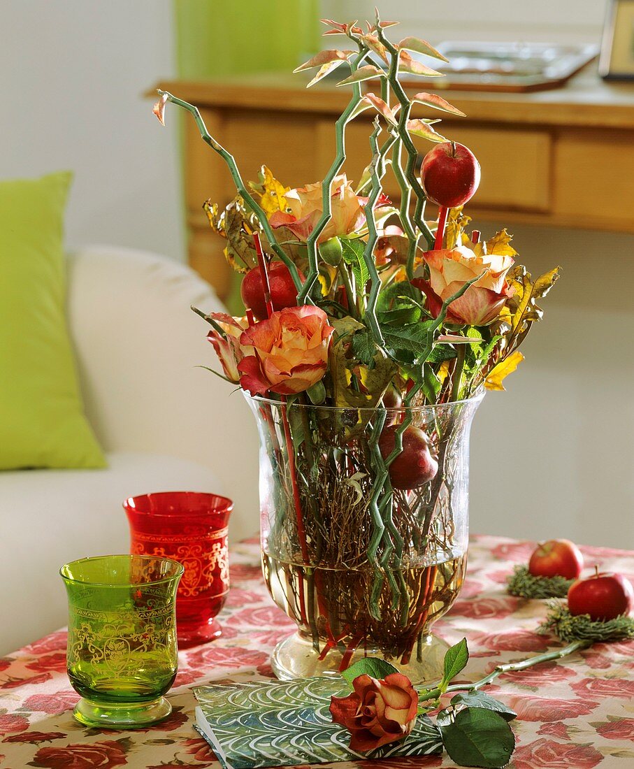 Glass with Perilepta, roses, apples on sticks