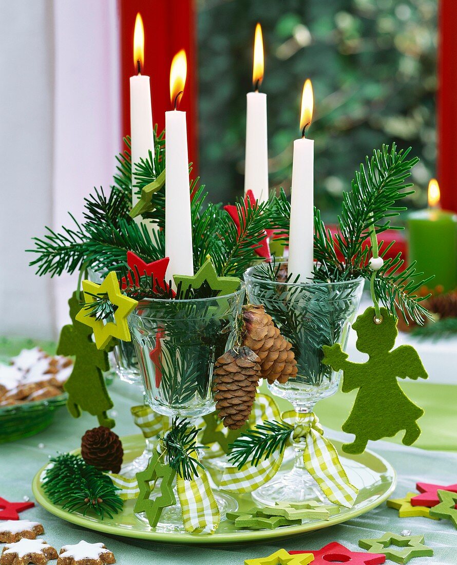 Unusual Advent wreath with candles in wine glasses