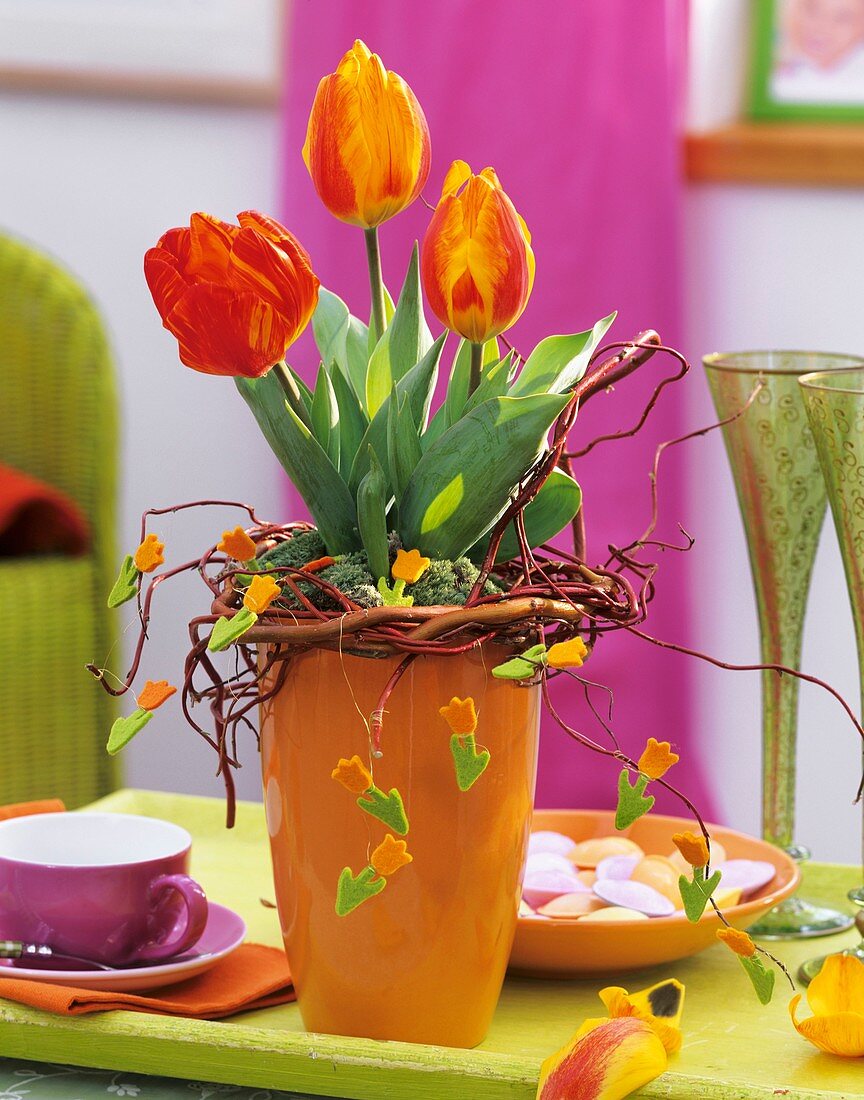 Vase of tulips with willow wreath and felt tulips