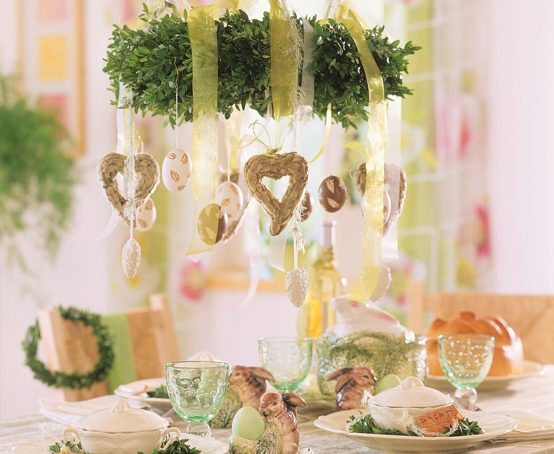 Easter table decoration with hanging wreath