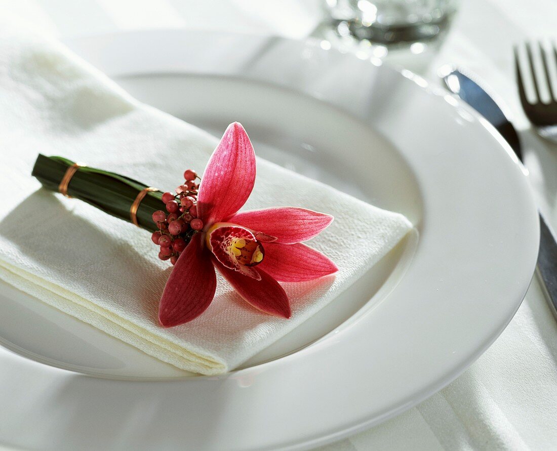 Orchid as napkin decoration