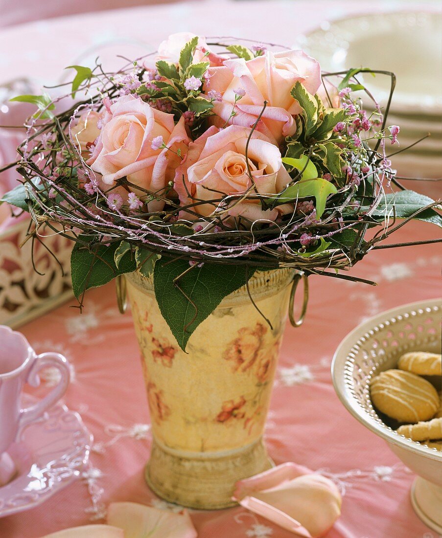 Roses in beige vase