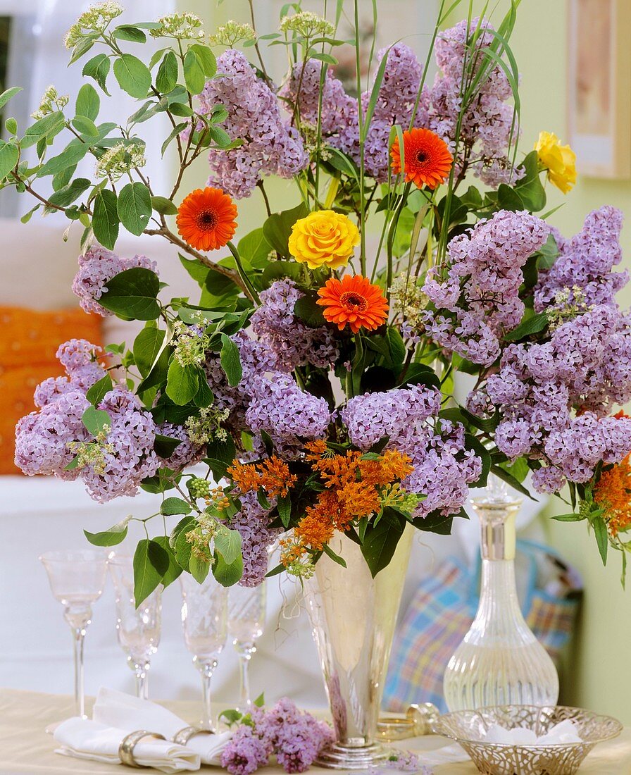 Lilac with wayfaring tree, gerberas and roses