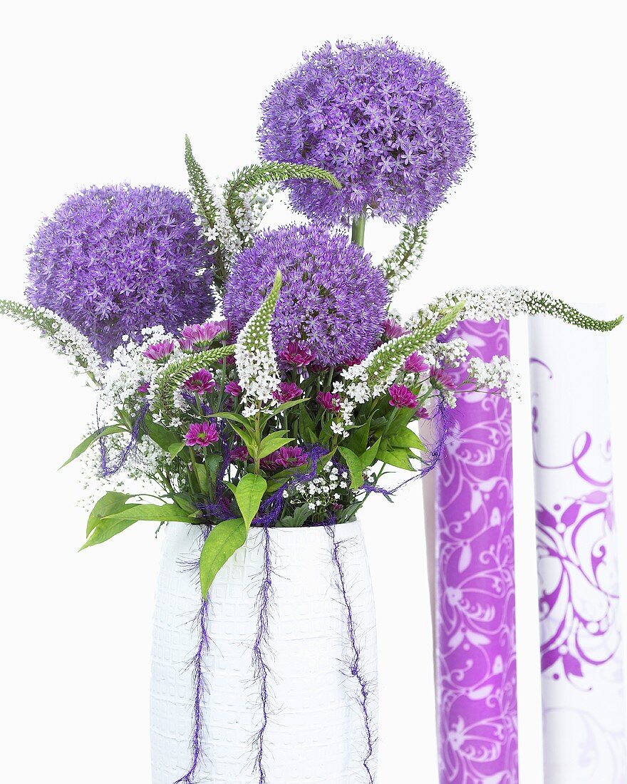 Vase of purple summer flowers