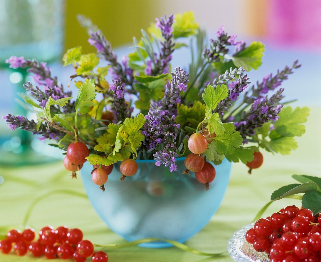 Small summery arrangement of lavender and berries 