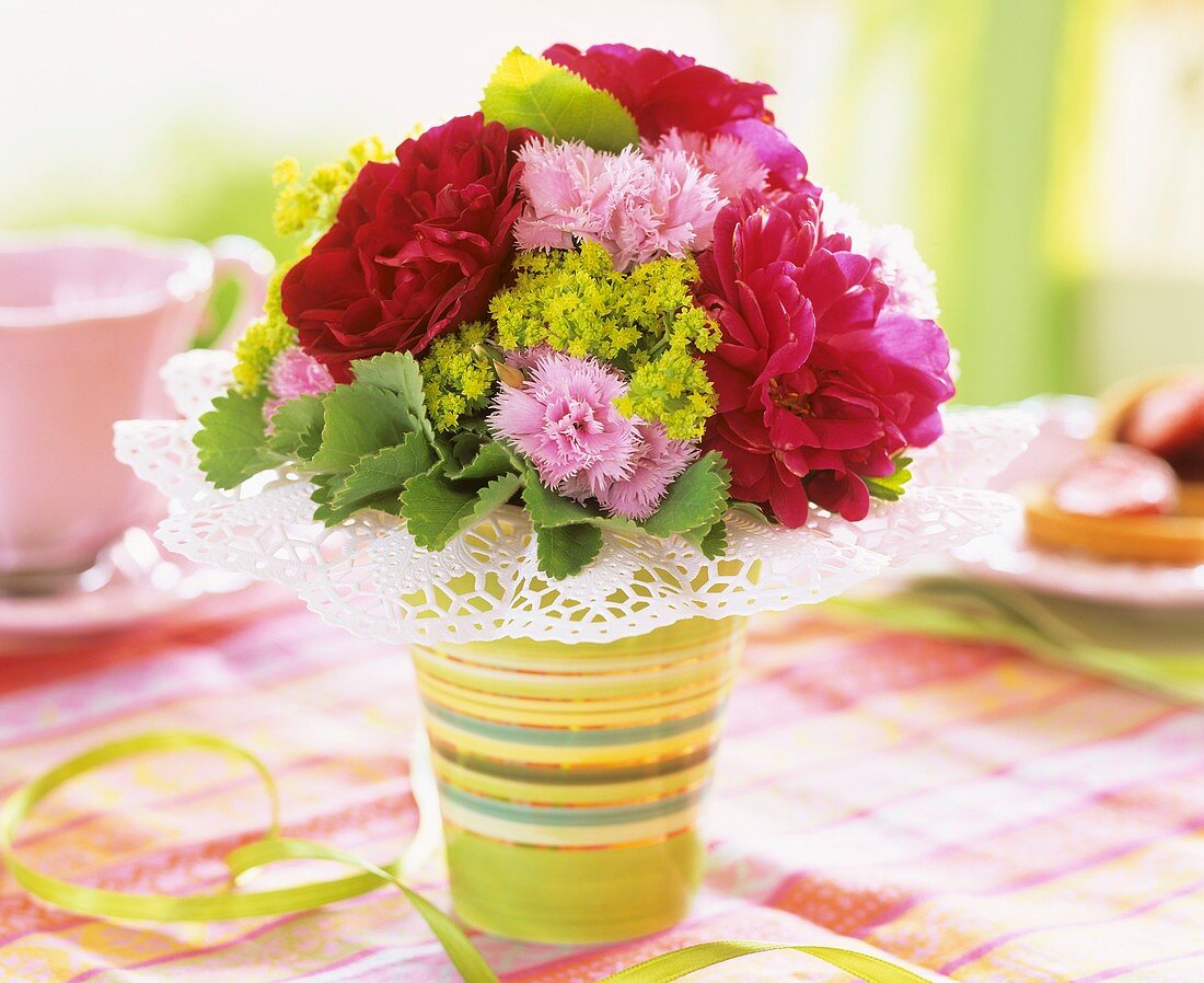 A posy of roses, pinks and lady's mantle