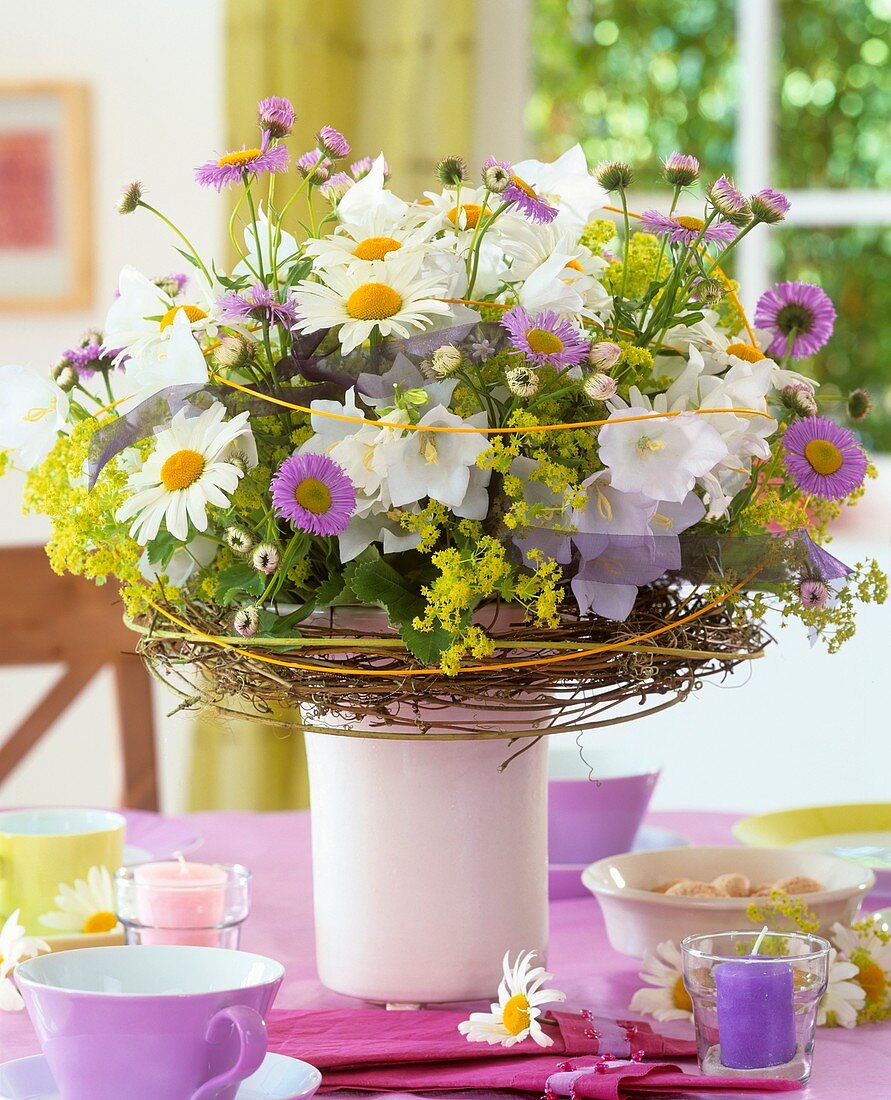 Vase of marguerites and asters