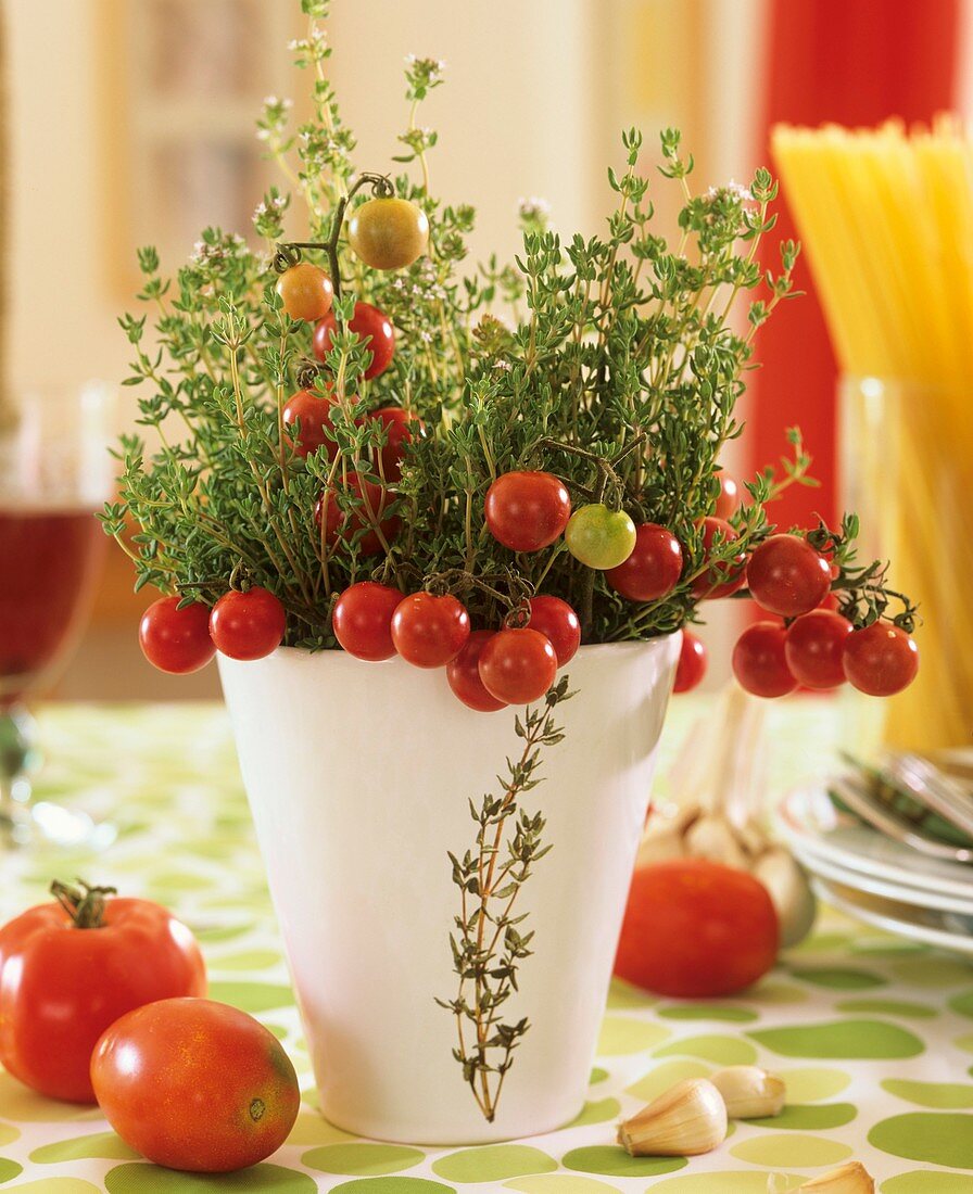 Posy of thyme and cocktail tomatoes