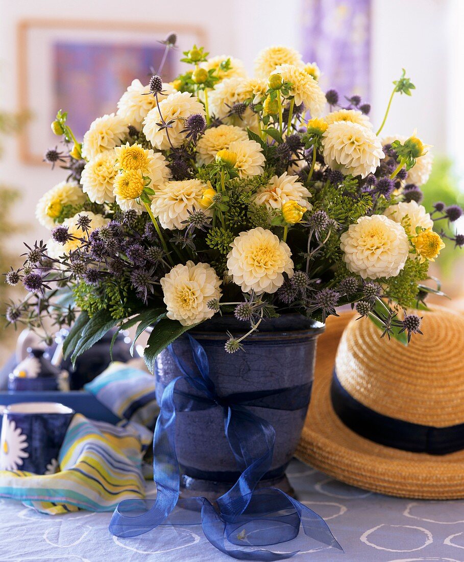 Arrangement of dahlias and silver thistles