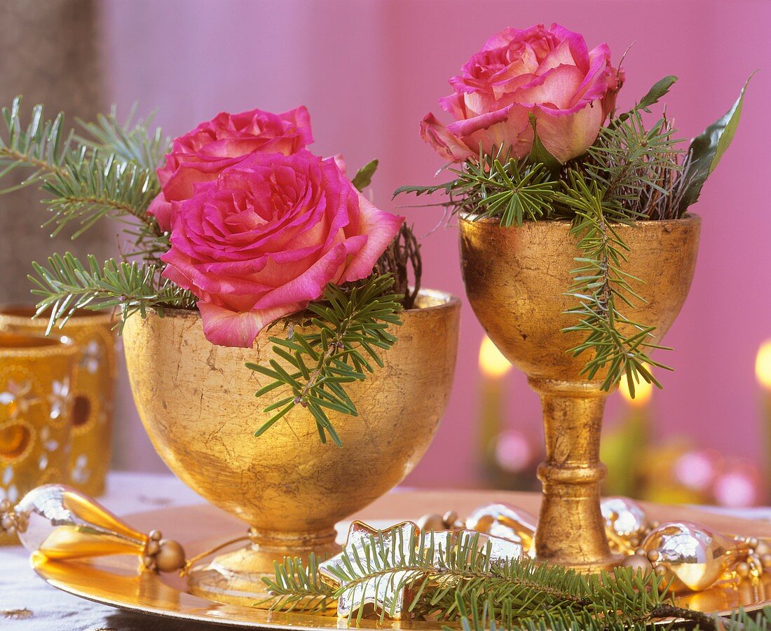 Roses with Korean fir in gold goblets