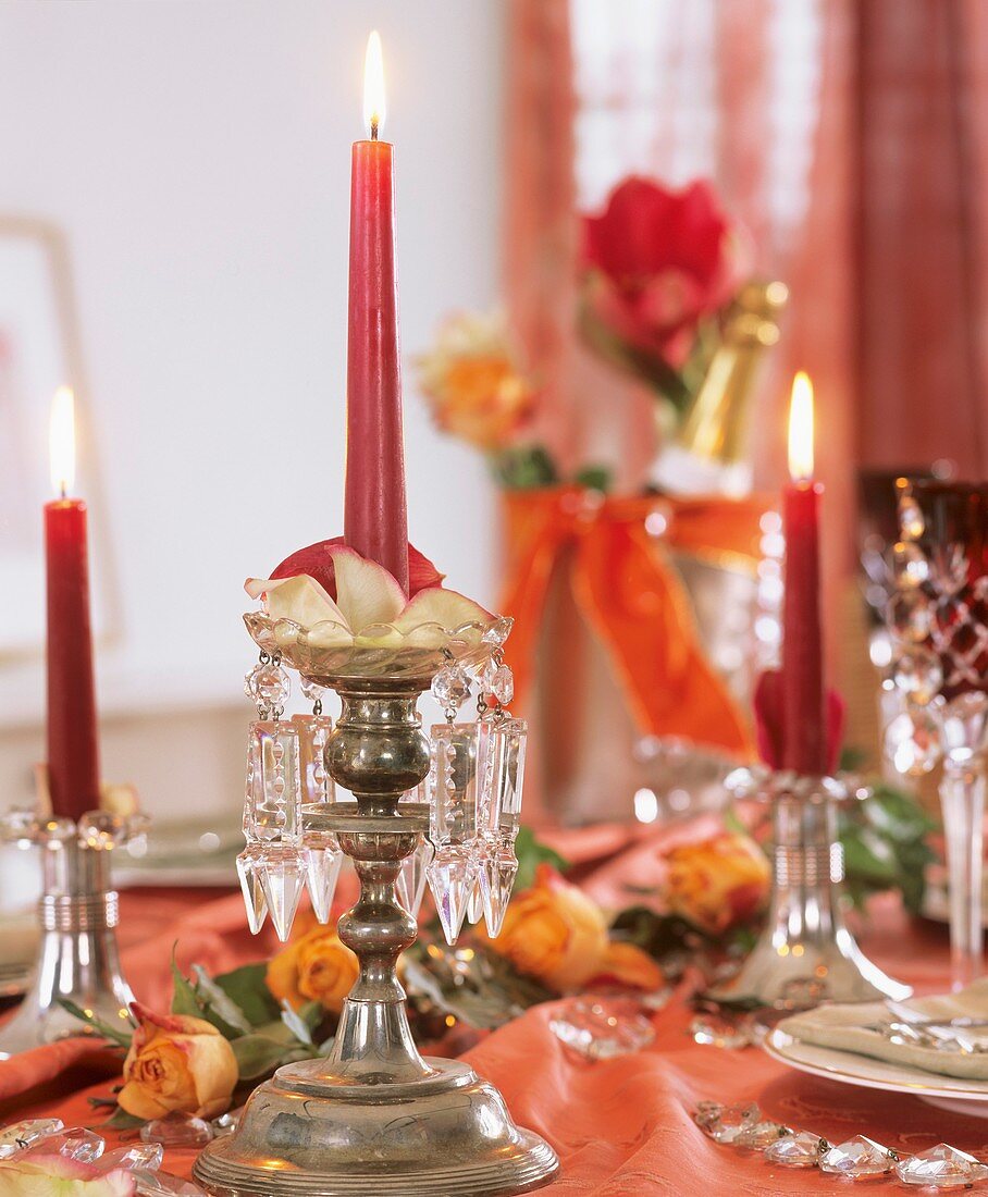 Candlestick with crystal hangings, rose petals & candle