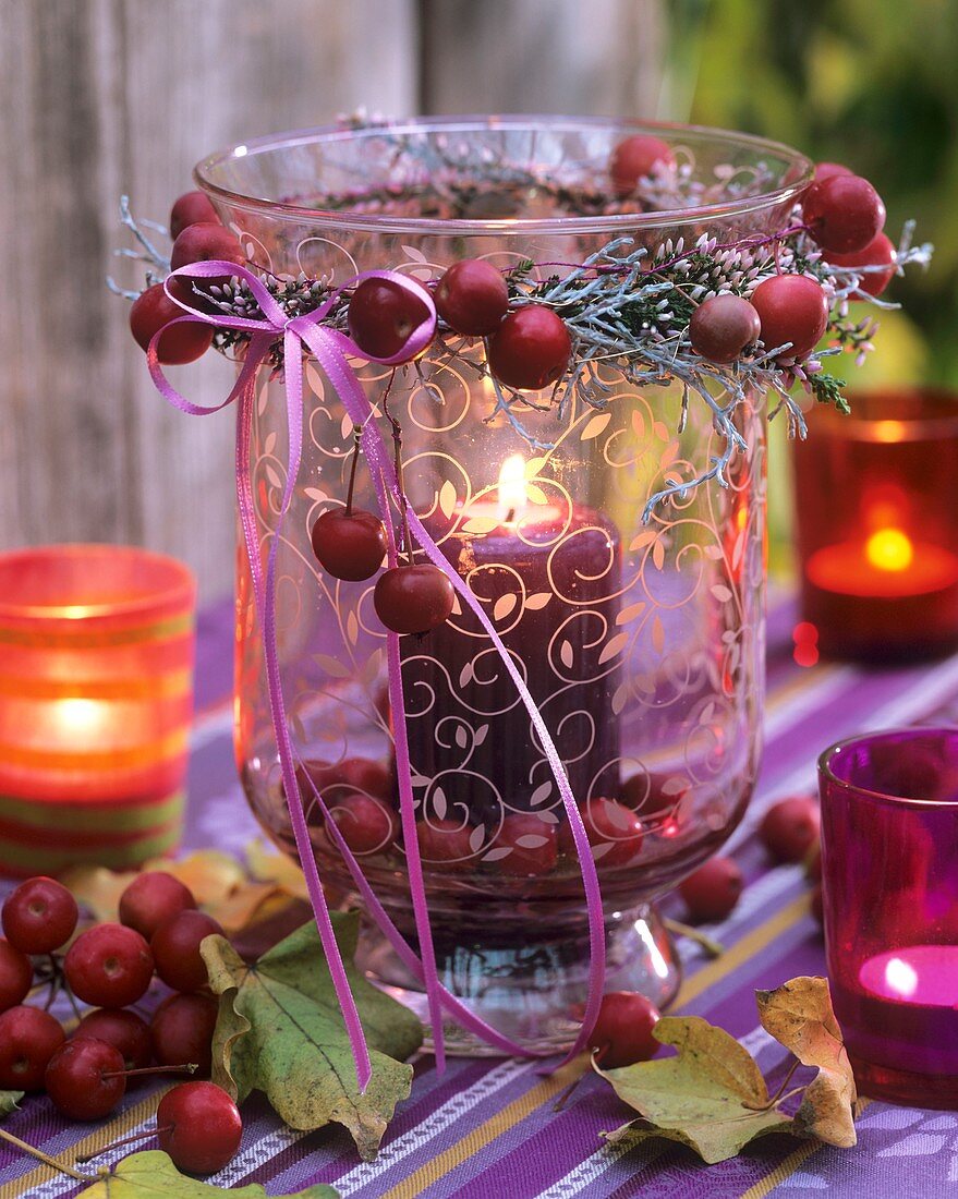 Patterned windlight decorated with wreath of crab apples