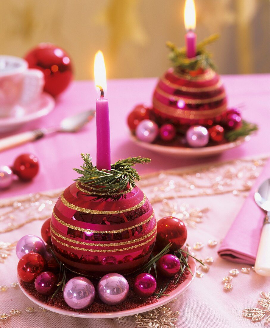 Christmas baubles used as candle holders