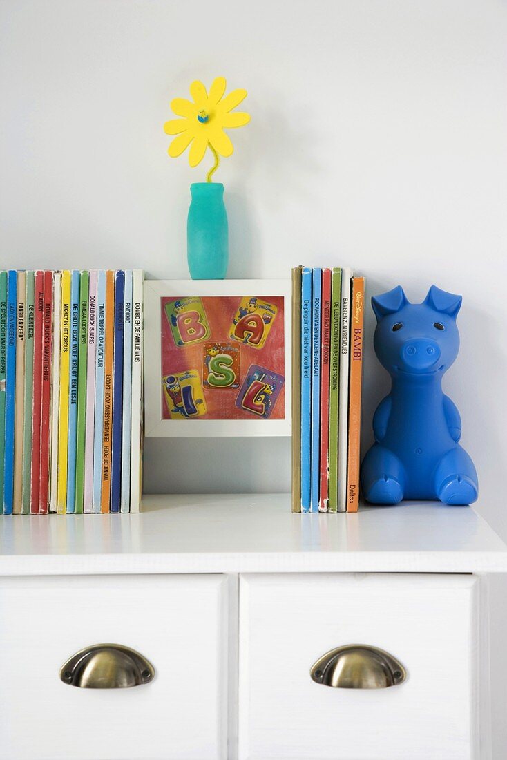 Books on cabinet