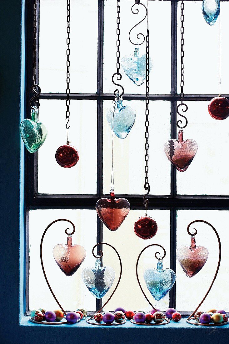 Heart-shaped decorations by a window
