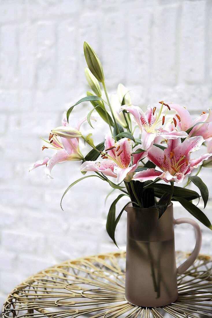 Lilies in a glass jug