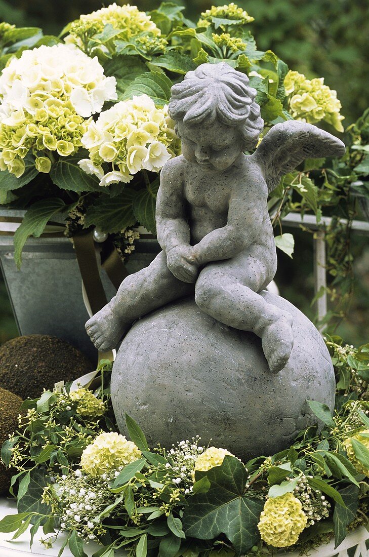 Hydrangeas and a cherub on a terrace