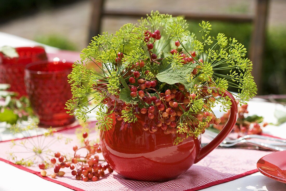 Posy of guelder rose berries and dill