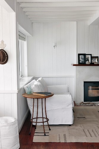 White Couch And Small Side Table In Buy Image 11168443 Living4media