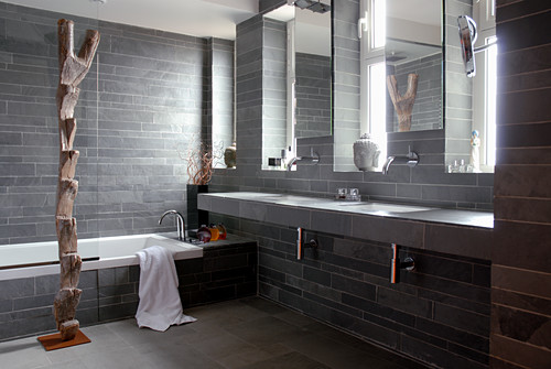 A Grey Bathroom With Stone Tiles On The Image 11018277 A Grey Bathroom With Stone Tiles On The