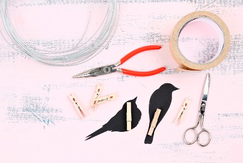 Utensils for making bird silhouettes on a wire