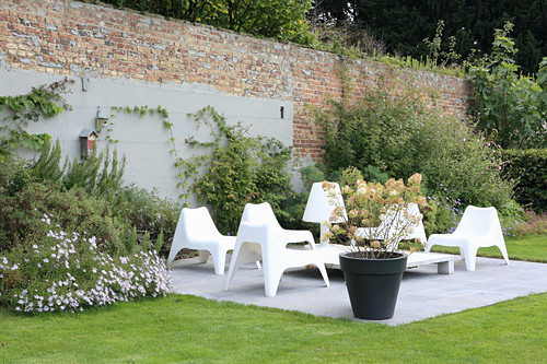 White Plastic Chairs On Terrace In Front Buy Image 12454349 Living4media