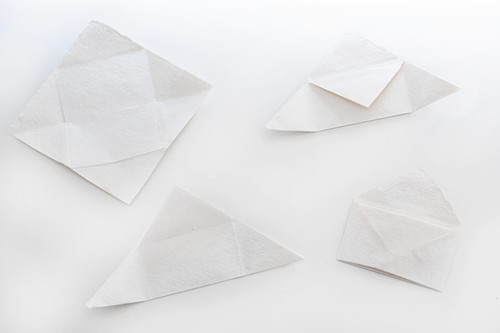 Folding paper into and envelope