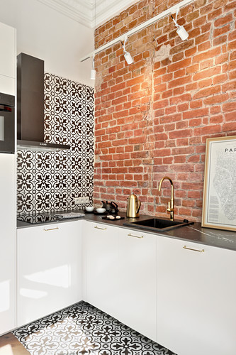 Kitchen with brick wall and … – Buy image – 12569513 ❘ living4media