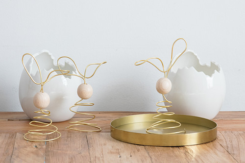 Easter bunnies made from golden wire and wooden beads