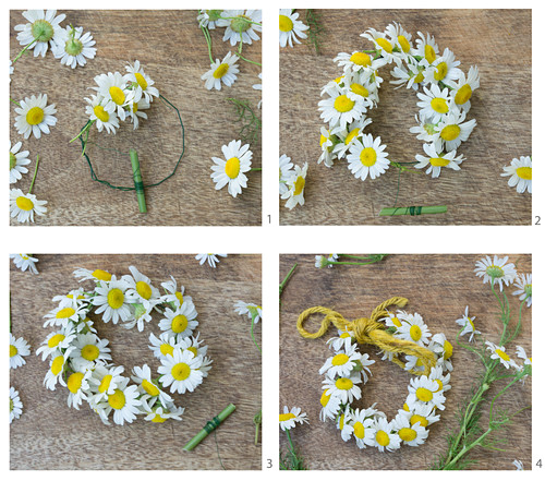 Tying a little wreath of chamomile flowers