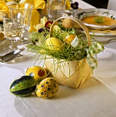 Easter basket: chip basket with Easter eggs on table